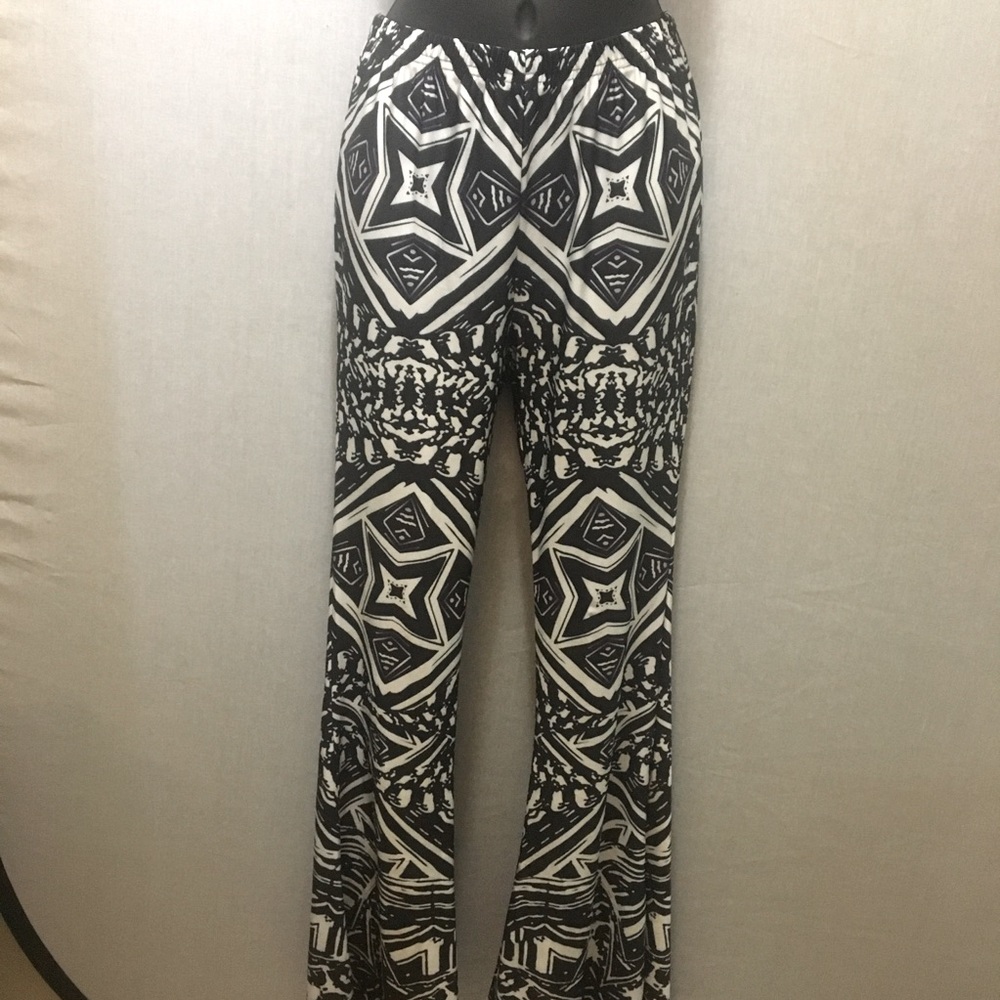 *3 for $20* Funky pattern flare leg stretch pants